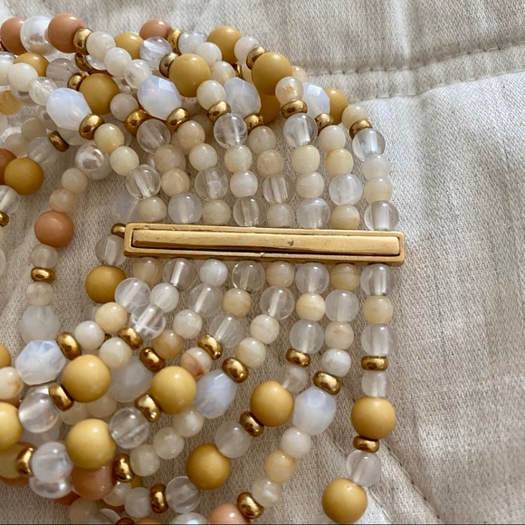 MULTI STRAND BEAD BRACELET IN WHITE TAN AND GOLD - Picture 4 of 7